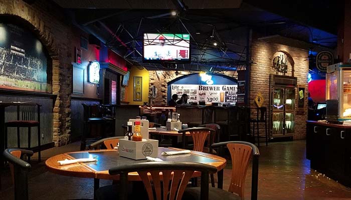 Indoor restaurant and bar seating at Ardie's Sports bar and Grill in La Crosse, WI.